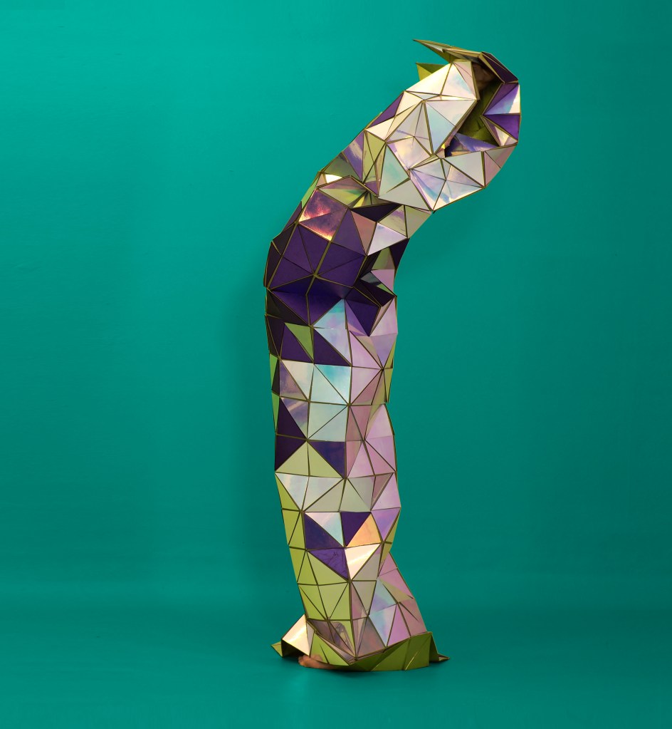 silver and purple metallic crumpling column with folds, on teal background